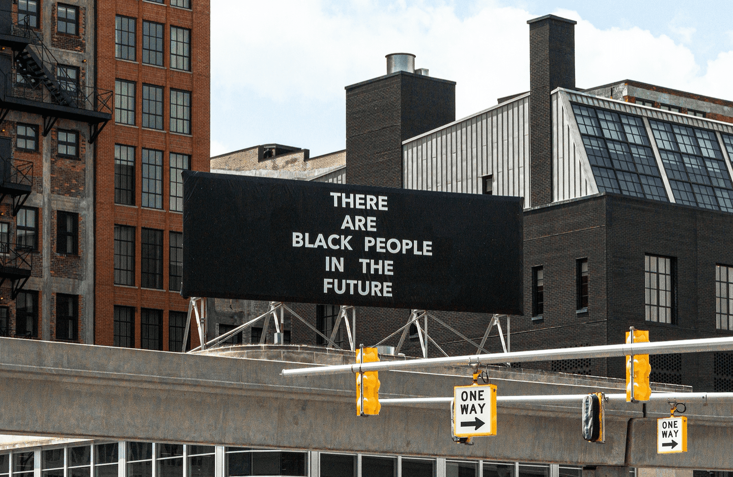 photo of city with there are black people in the future sign