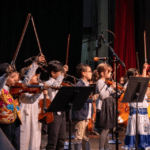 Latinx youth orchestra ensemble in concert